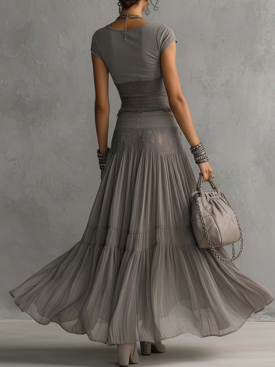 Completo Grigio: Top con Pannelli in Pizzo Trasparente e Gonna Maxi Plissettata