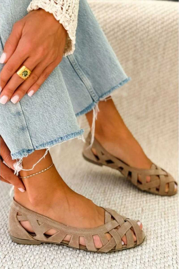 Sandali piatti con punta aperta e tessuto intrecciato